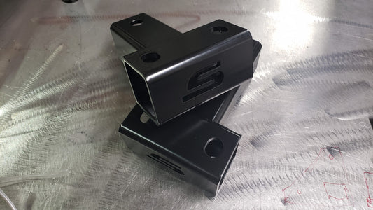 TRAILING ARM SPACERS (TAS)